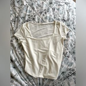 White Timing Body Suit. Size is a L. Brand New never worn.